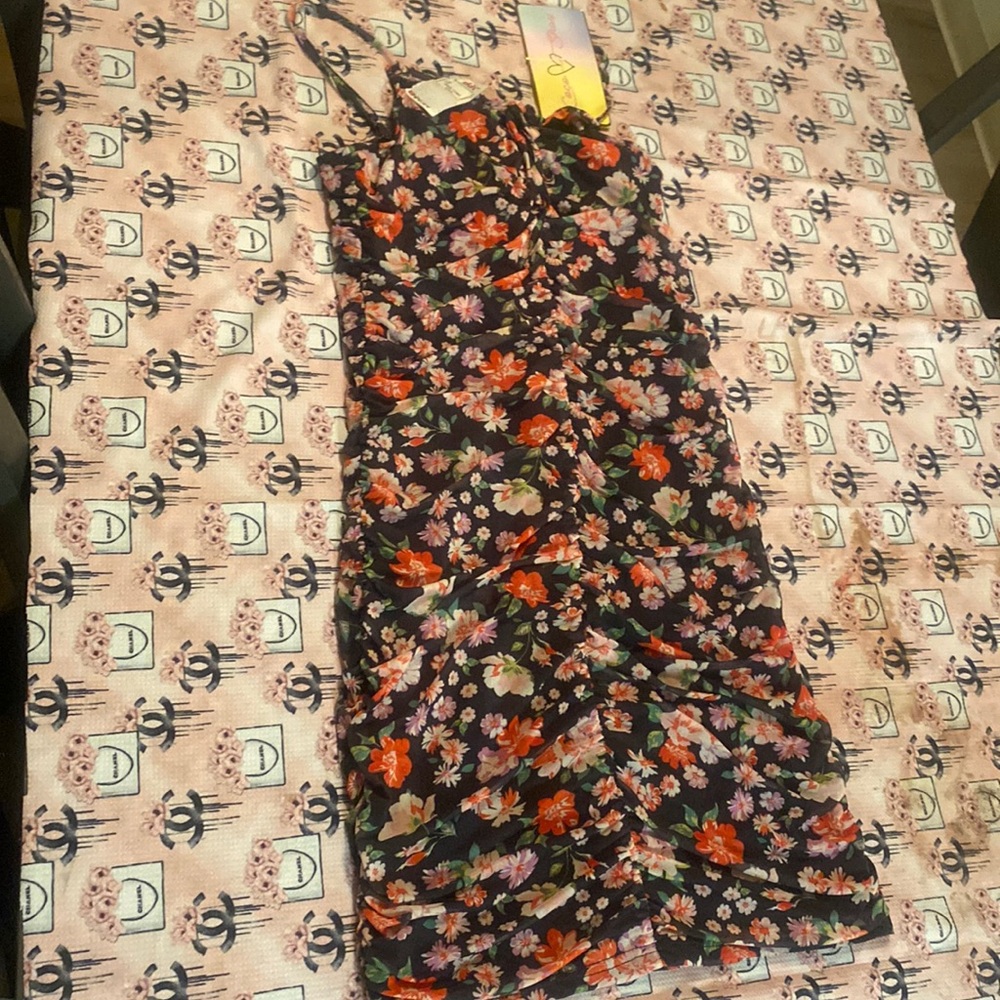 Floral dress! Perfect to show off legs in for the summer.